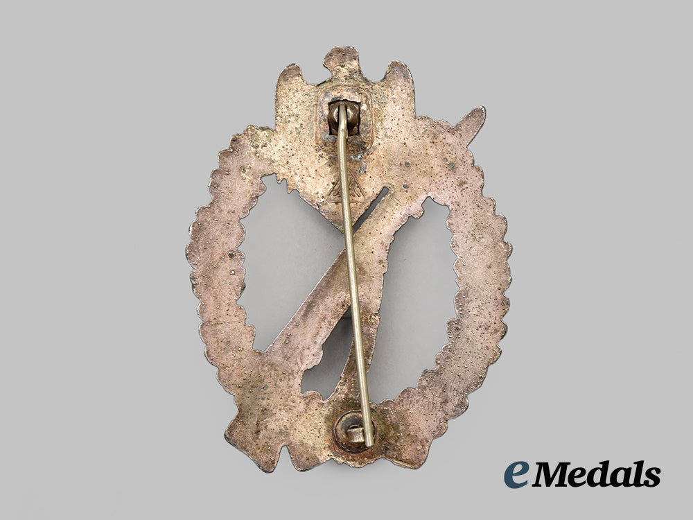 germany,_wehrmacht._an_infantry_assault_badge,_silver_grade,_mk-_marked__mnc6596
