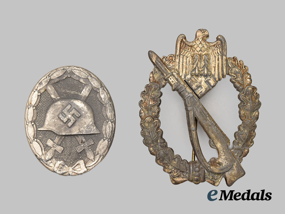 germany,_wehrmacht._a_pair_of_service_badges__mnc6722