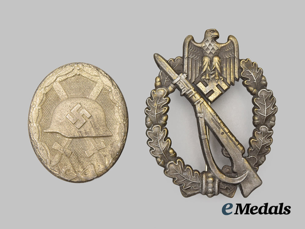 germany,_wehrmacht._a_pair_of_service_badges__mnc6726