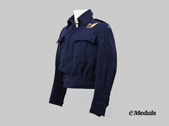Canada, Commonwealth. A 1944 RCAF, Australian Made Navigators Battle Blouse with Cap