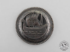 A Second War Sympathizer's Viking Ship Brooch