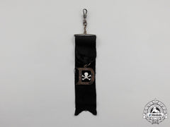 A 1918 Commemorative Skull & Bones Watch Fob