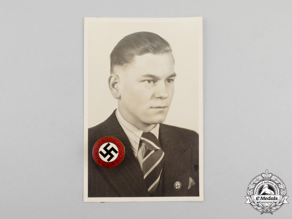 an_nsdap_party_badge_with_photo_of_recipient_n_705_1