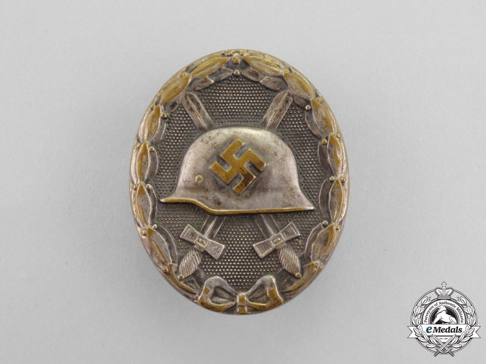 a1940_model_ldo_cased_silver_grade_wound_badge_by_c.f._zimmermann_o_331_1