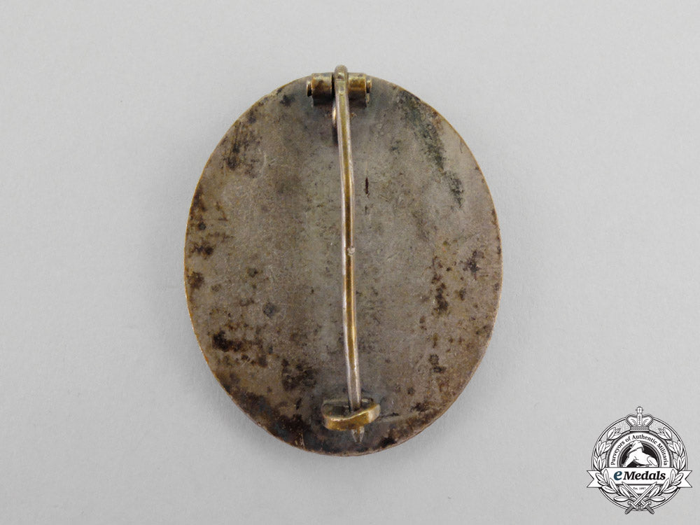 a1940_model_ldo_cased_silver_grade_wound_badge_by_c.f._zimmermann_o_332_1