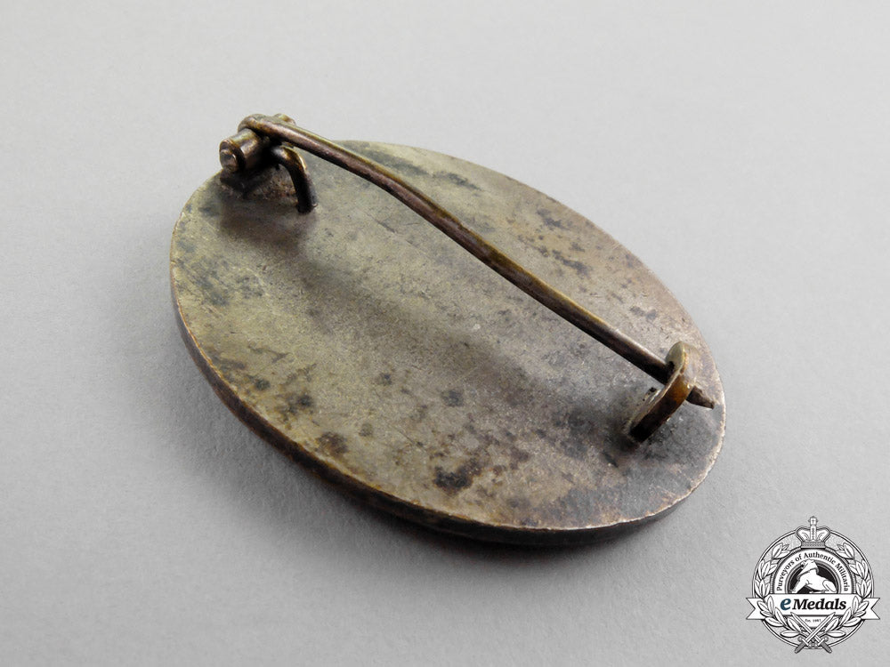 a1940_model_ldo_cased_silver_grade_wound_badge_by_c.f._zimmermann_o_333_1