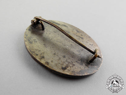 a1940_model_ldo_cased_silver_grade_wound_badge_by_c.f._zimmermann_o_333_1