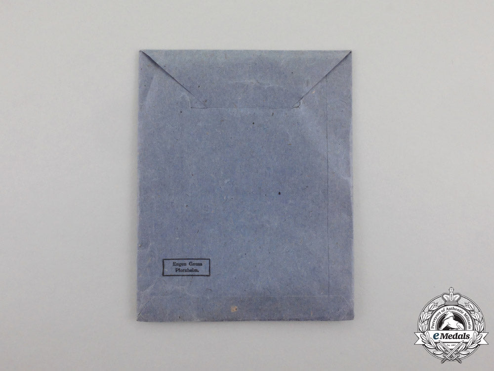 an_iron_cross1939_second_class_in_its_packet_of_issue_by_eugen_grauss_of_pforzheim_o_693_1