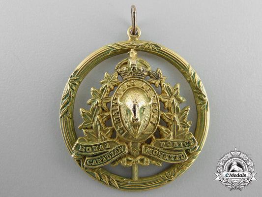 a_royal_canadian_mounted_police_sweetheart_pendant_in_gold_o_844