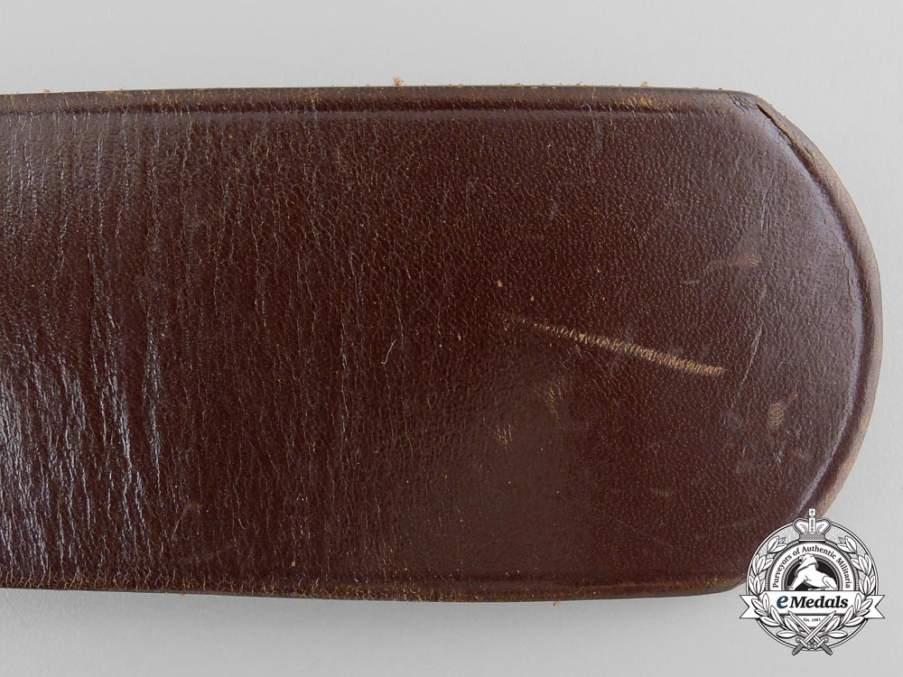 a_brown_forestry_belt_with_single_open_claw_buckle_o_933_1
