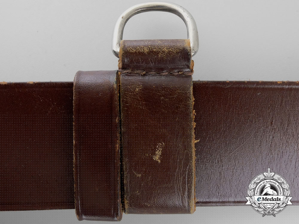 a_brown_forestry_belt_with_single_open_claw_buckle_o_935_1