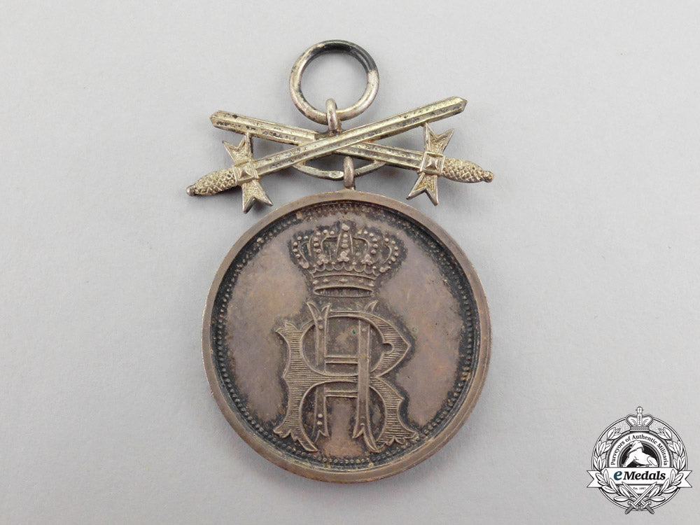 reuß._a1909-1918_silver_merit_medal_with_swords_to_the_princly_honour_cross_p_118_1