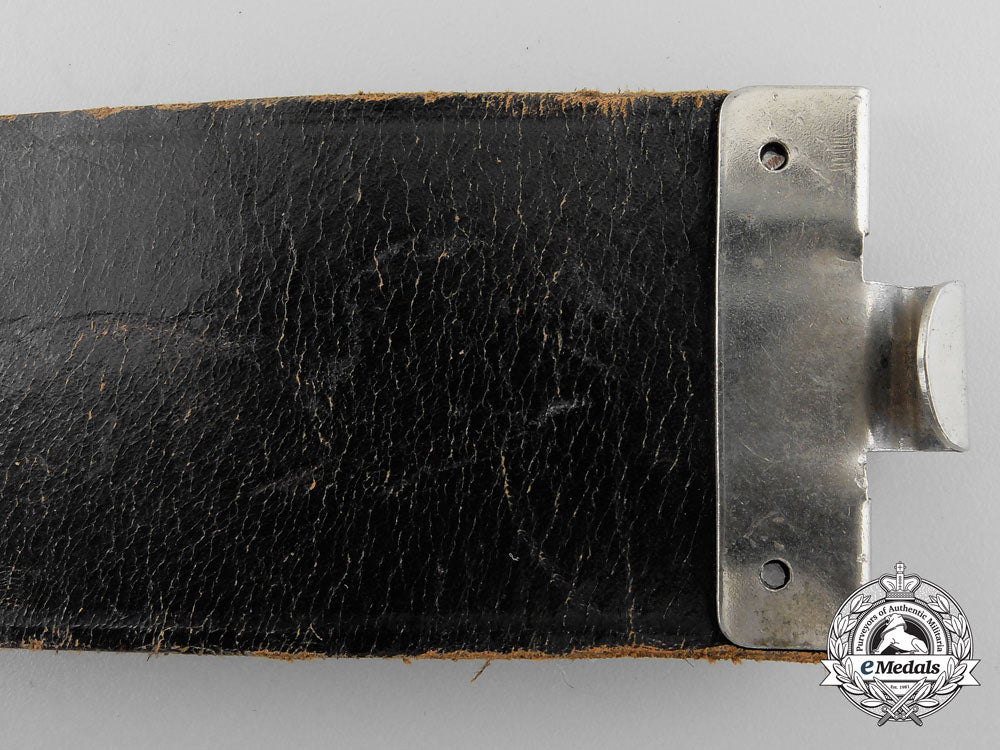 a_black_german_police_officer's_belt_with_rzm_control_stamping&_named._p_154