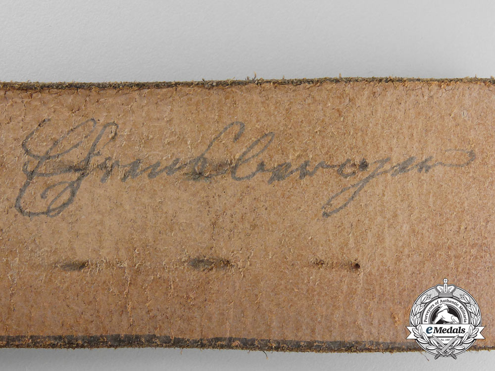 a_black_german_police_officer's_belt_with_rzm_control_stamping&_named._p_157