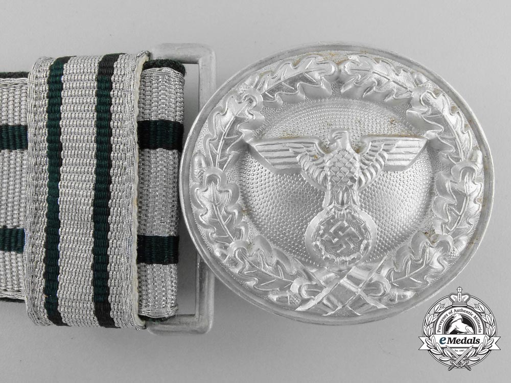 a_national_forestry_service_official's_dress_brocade_belt_with_buckle;_published_example_p_553