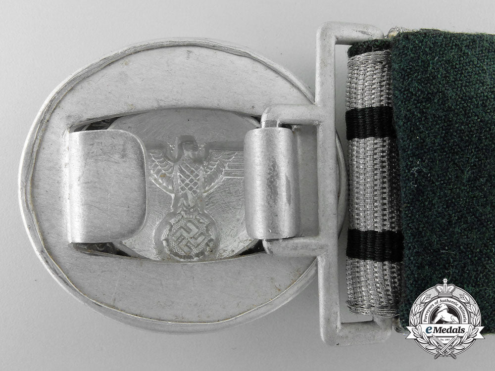 a_national_forestry_service_official's_dress_brocade_belt_with_buckle;_published_example_p_554