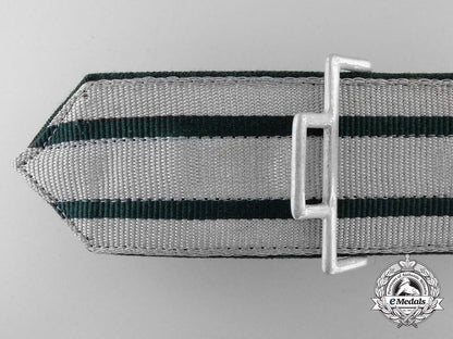 a_national_forestry_service_official's_dress_brocade_belt_with_buckle;_published_example_p_556