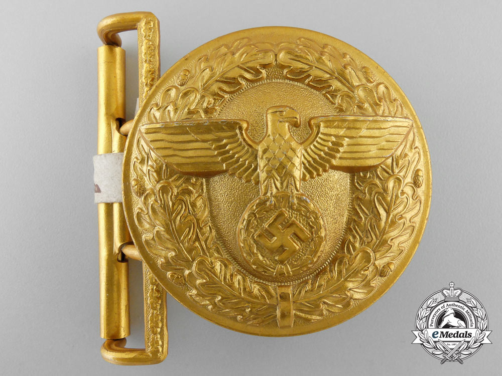 a_political_leader's_belt_buckle_by_overhoff&_cie;_rzm_control_tagged_q_090