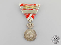 Austria, Imperial. A Silver Military Merit Medal, 3Rd Time Awarded, With Wartime Ribbon And Swords