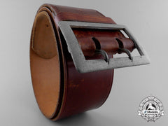 A Brown Leather Belt With Double Open Claw Buckle; Heer Stamped