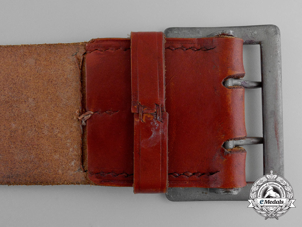 a_brown_leather_belt_with_double_open_claw_buckle;_heer_stamped_q_359