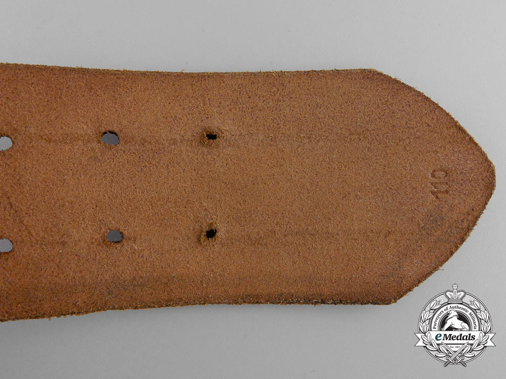 a_brown_leather_belt_with_double_open_claw_buckle;_heer_stamped_q_362