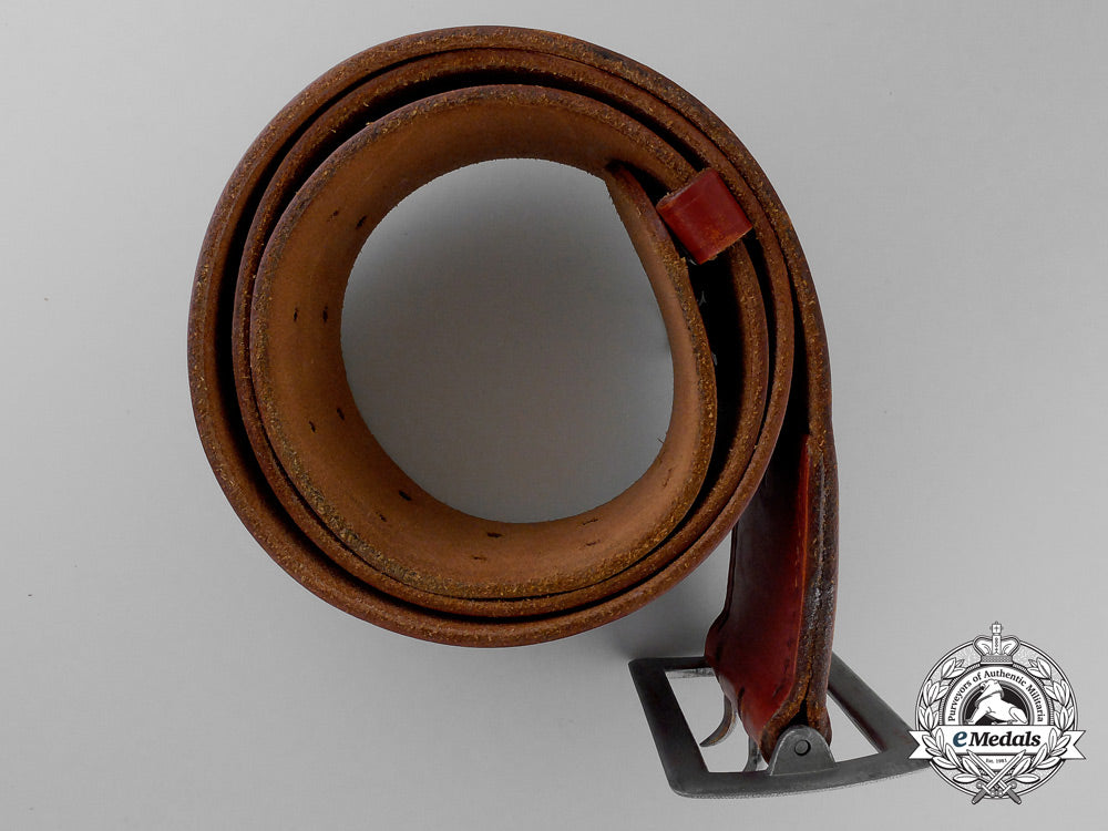 a_brown_leather_belt_with_double_open_claw_buckle;_heer_stamped_q_363