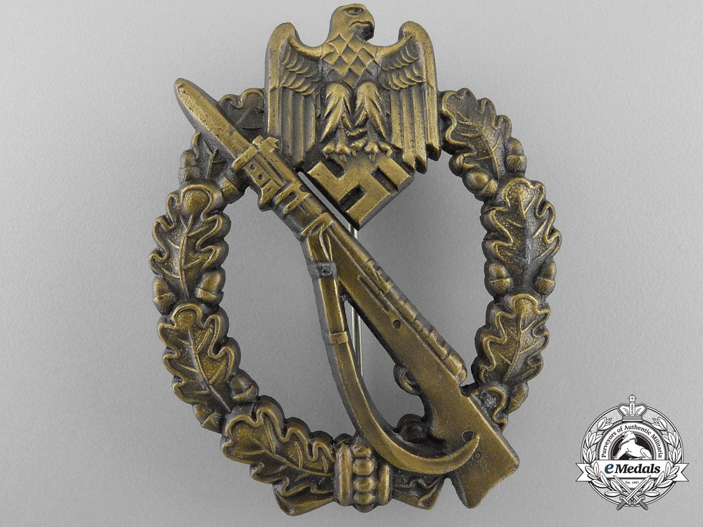 a_mint_bronze_grade_infantry_badge_with_packet_of_issue_by_josef_feix&_sohn_q_658