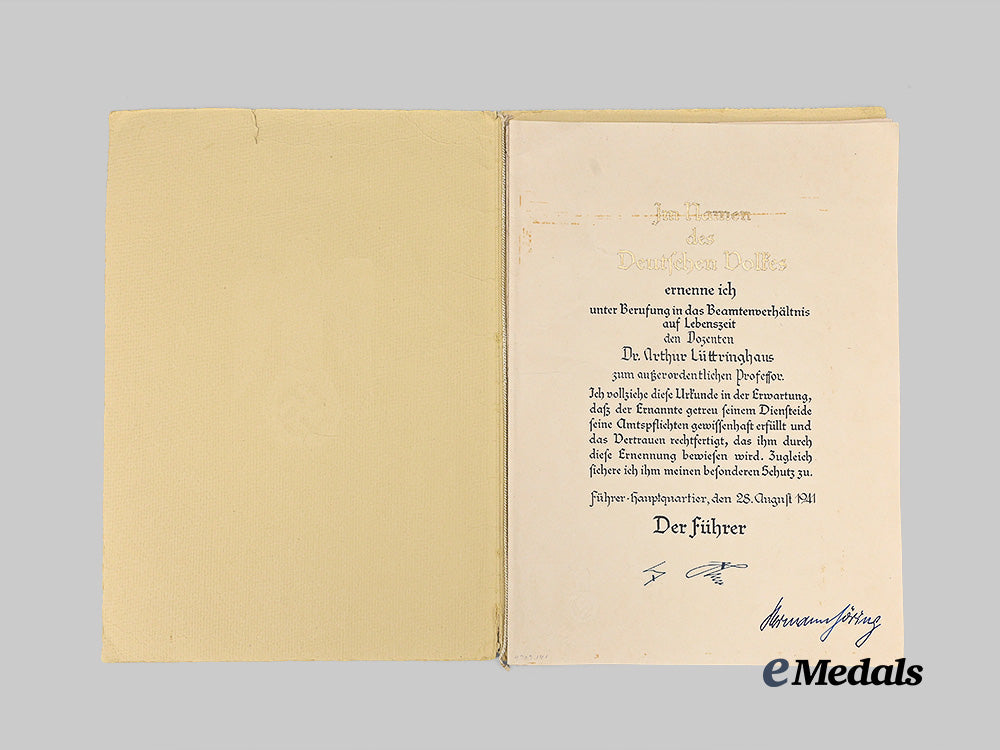 germany,_third_reich._a_pair_of_professional_documents_to_hauptmann_der_reserve_dr._arthur_lüttringhaus,_with_hermann_göring_signature_e_medals__m0044-293_4