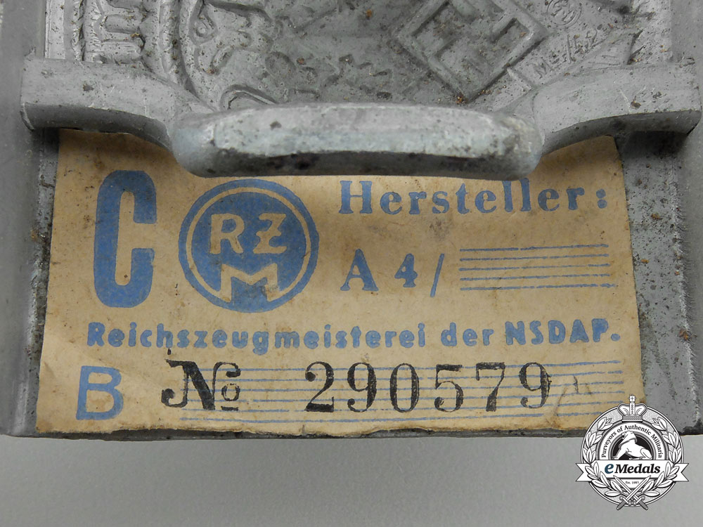 an_hj_belt_buckle_by_hermann_aurich;_published_with_rzm_control_tag_r_233