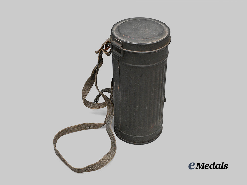 germany,_wehrmacht._an_m30_gas_mask,_with_canister_e_medals__g62679_3