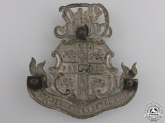 A First War Cambridge University Cap Badge
