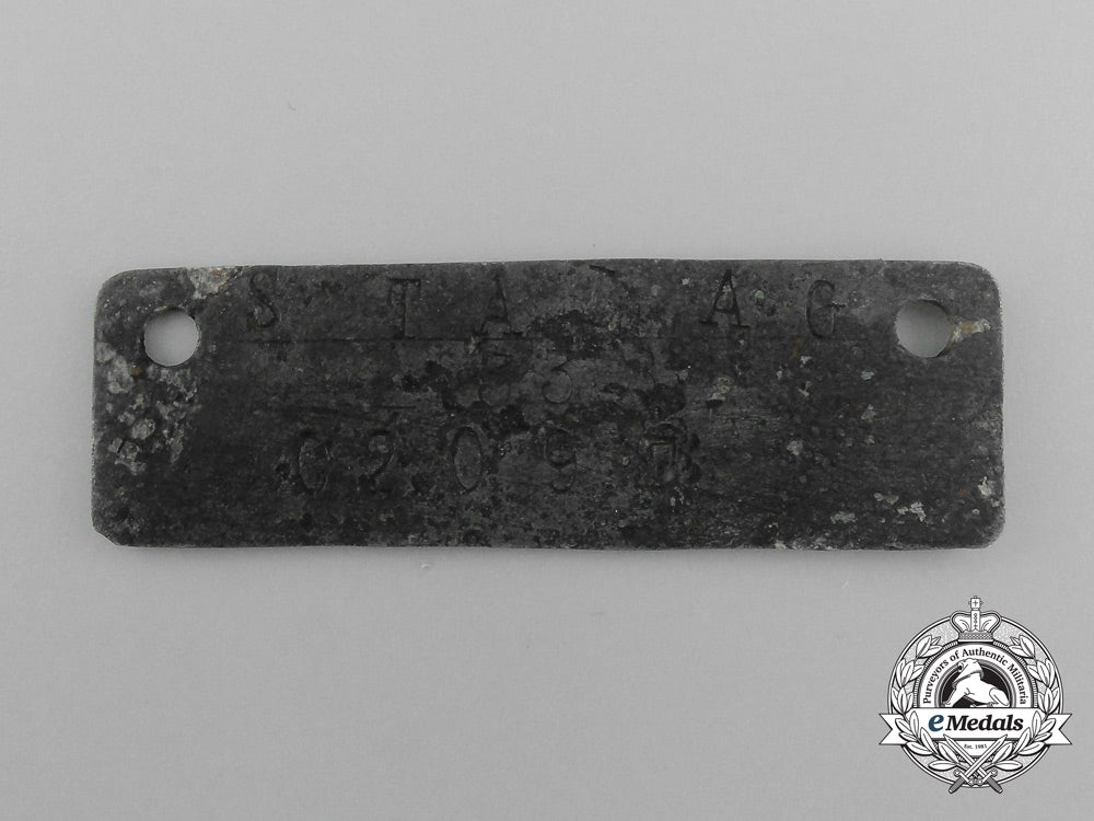 a_numbered02097_stalag333_beniaminow_pow_identification_disc_s0390045_1