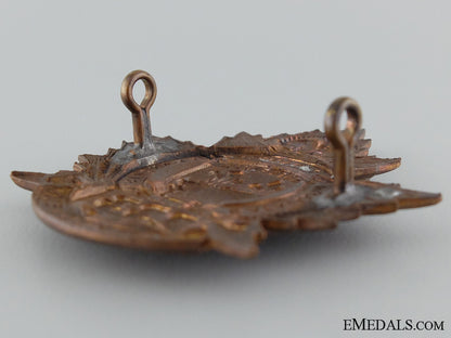 wwi233_rd_infantry_battalion"_canadiens_francais"_cap_badge_s0580117