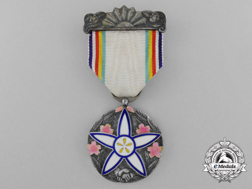 japan,_occupied_manchukuo._a1937_cultural_revitalization_medal_with_case_s0663082