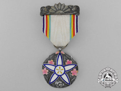 japan,_occupied_manchukuo._a1937_cultural_revitalization_medal_with_case_s0663082