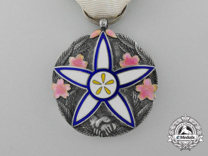 japan,_occupied_manchukuo._a1937_cultural_revitalization_medal_with_case_s0673083