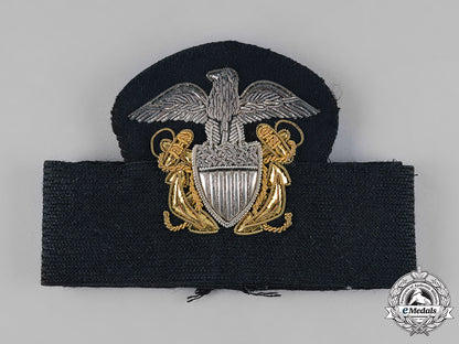 united_states._a_navy_cap_badge_and_three_shoulder_boards_s19_0192_1_1