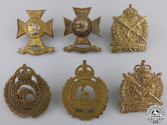 Six New Zealand First War Period Cap Badges