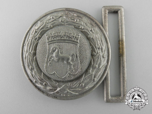 a_hanover_fire_defence_service_officer's_belt_buckle;_published_example_t_639