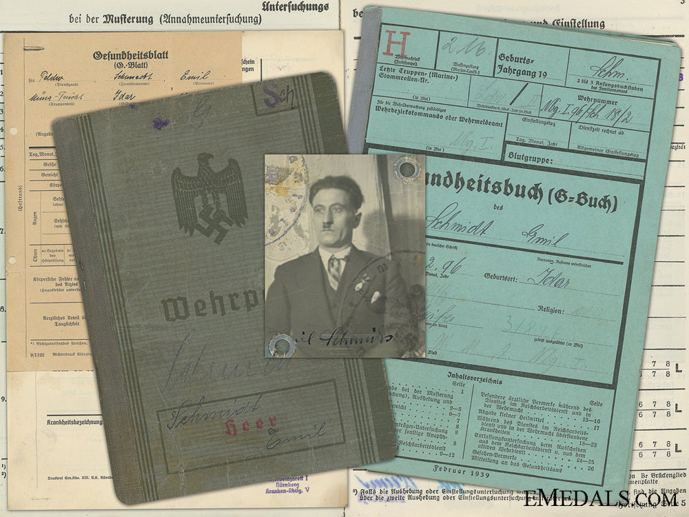 the_wehrpass_of_emil_schmitz;_iron_cross_recipient_the_wehrpass_of__5453cdb3084b5