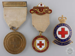 Two British Red Cross Society Medals And One Badge