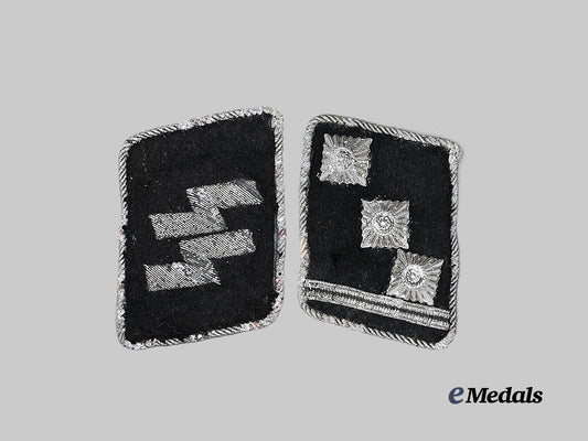 germany,_s_s._a_set_of_waffen-_s_s_collar_tabs_for_an_s_s-_obersturmführer,_battlefield_retrieval_e_medals__g62980_2
