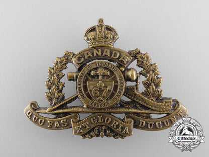 a_first_war67_th_university_of_toronto_overseas_field_battery_cap_badge,_w_467