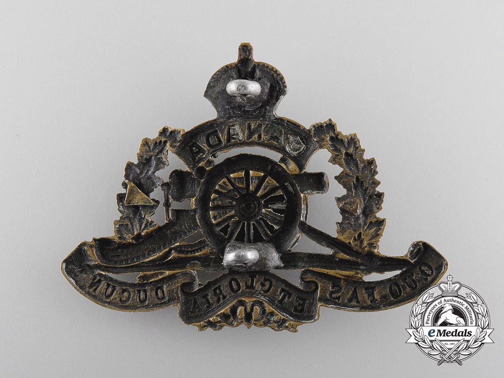 a_first_war67_th_university_of_toronto_overseas_field_battery_cap_badge,_w_468