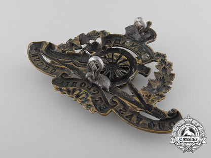 a_first_war67_th_university_of_toronto_overseas_field_battery_cap_badge,_w_469