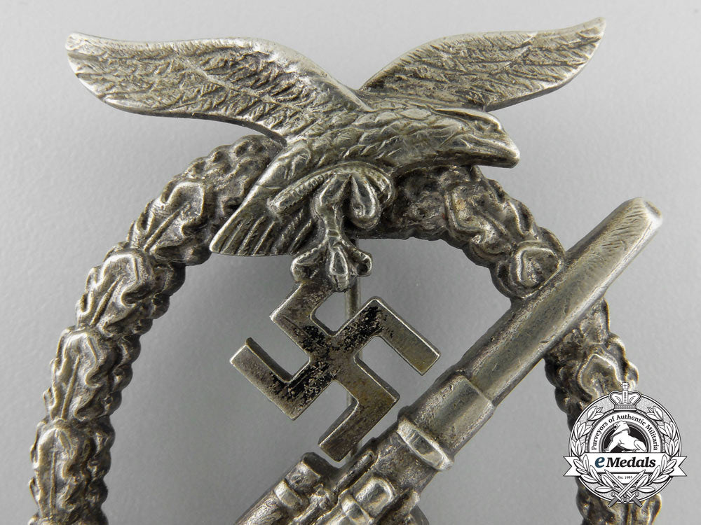 an_early_luftwaffe_flak_badge_in_tombac_with_ball_hinge_w_598