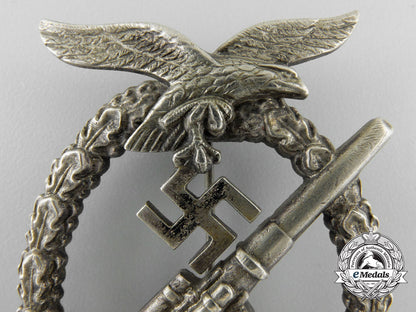 an_early_luftwaffe_flak_badge_in_tombac_with_ball_hinge_w_598