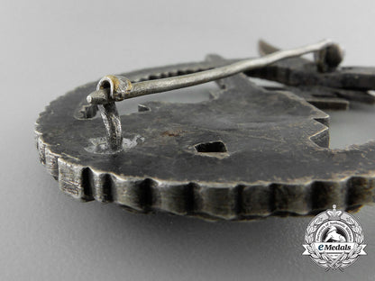 an_early_luftwaffe_flak_badge_in_tombac_with_ball_hinge_w_602