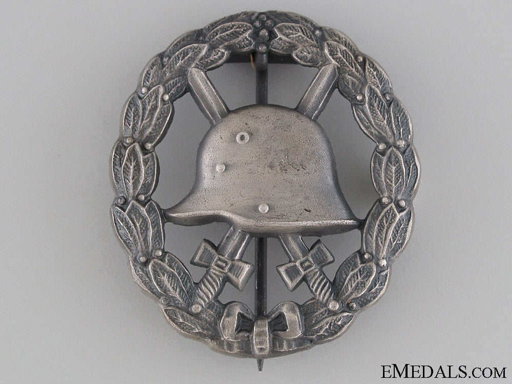 wwi_wound_badge-_cut_out_silver_grade_wwi_wound_badge__52a8c8e412df0